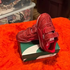 Sparkling Red Puma tennis shoes. Size 7 new no tags